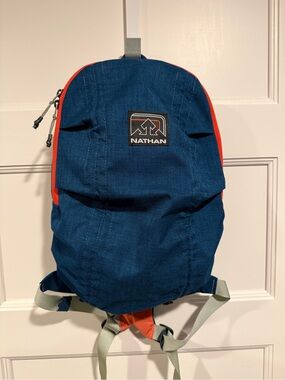 Nathan Navy and Orange Compact Outdoor Backpack